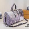 69303a83f09edb6de4c4d0da Louis Vuitton Classic Keepall 45 Travel Bag in Soft Pink Tones, Model No. 59943 41418