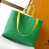 69303d06f09edb6de4c4d47d M24457 Yellow Green Blue Top Quality Original Order This Medium Shopper Handbag Draws Inspiration from Louis Vuitton's Shopping Bag Featuring 'Louis Vuitton' and 'Maison Fondée En 1854' Embossed on Soft Cowhide Leather with Top Handles and Detachable Shoulder Strap 40.0 x 32.0 x 16.0 cm (L x H x W)