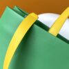 69303d09f09edb6de4c4d481 M24457 Yellow Green Blue Top Quality Original Order This Medium Shopper Handbag Draws Inspiration from Louis Vuitton's Shopping Bag Featuring 'Louis Vuitton' and 'Maison Fondée En 1854' Embossed on Soft Cowhide Leather with Top Handles and Detachable Shoulder Strap 40.0 x 32.0 x 16.0 cm (L x H x W)