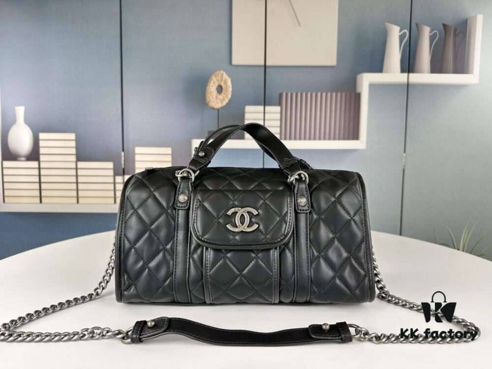 693041f2f09edb6de4c4d94e New Arrival Vintage Chanel Boston Bag in Black and Gold – Absolutely Collector-Level Cute!