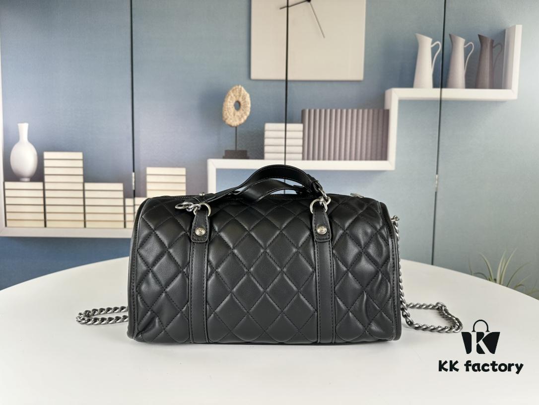 693041f3f09edb6de4c4d94f New Arrival Vintage Chanel Boston Bag in Black and Gold – Absolutely Collector-Level Cute!