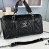 693041f5f09edb6de4c4d952 New Arrival Vintage Chanel Boston Bag in Black and Gold – Absolutely Collector-Level Cute!