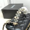6930423ff09edb6de4c4d9b0 Chanel 24P Arrival! Stunning Pearl-Handled Bag in Black Oil-Waxed Leather