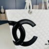 693042c1f09edb6de4c4da1c New Chanel Panda Carry Basket Bag in Classic Black and White