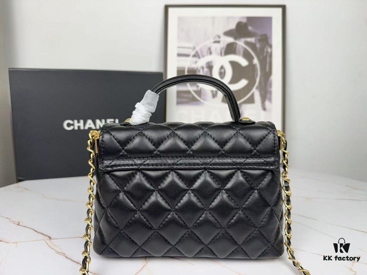 693043f1f09edb6de4c4db77 CHANEL 25P New Handle Top Handle Bag Mini in Black and Gold Lambskin