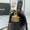 693043f2f09edb6de4c4db78 CHANEL 25P New Handle Top Handle Bag Mini in Black and Gold Lambskin