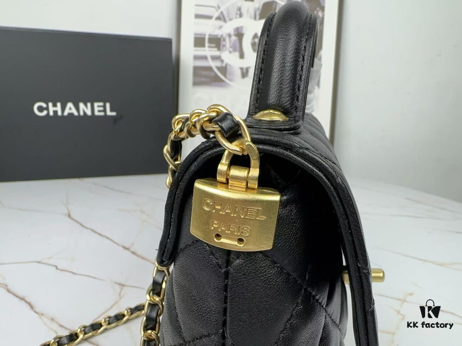 693043f2f09edb6de4c4db78 CHANEL 25P New Handle Top Handle Bag Mini in Black and Gold Lambskin