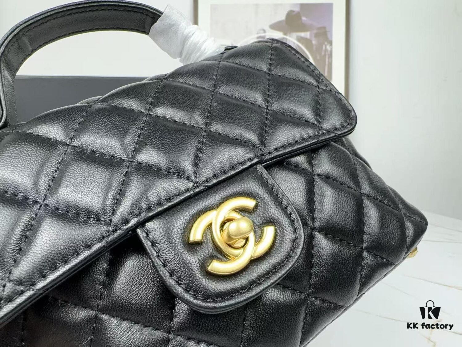 693043f3f09edb6de4c4db79 CHANEL 25P New Handle Top Handle Bag Mini in Black and Gold Lambskin