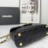 693043f4f09edb6de4c4db7b CHANEL 25P New Handle Top Handle Bag Mini in Black and Gold Lambskin