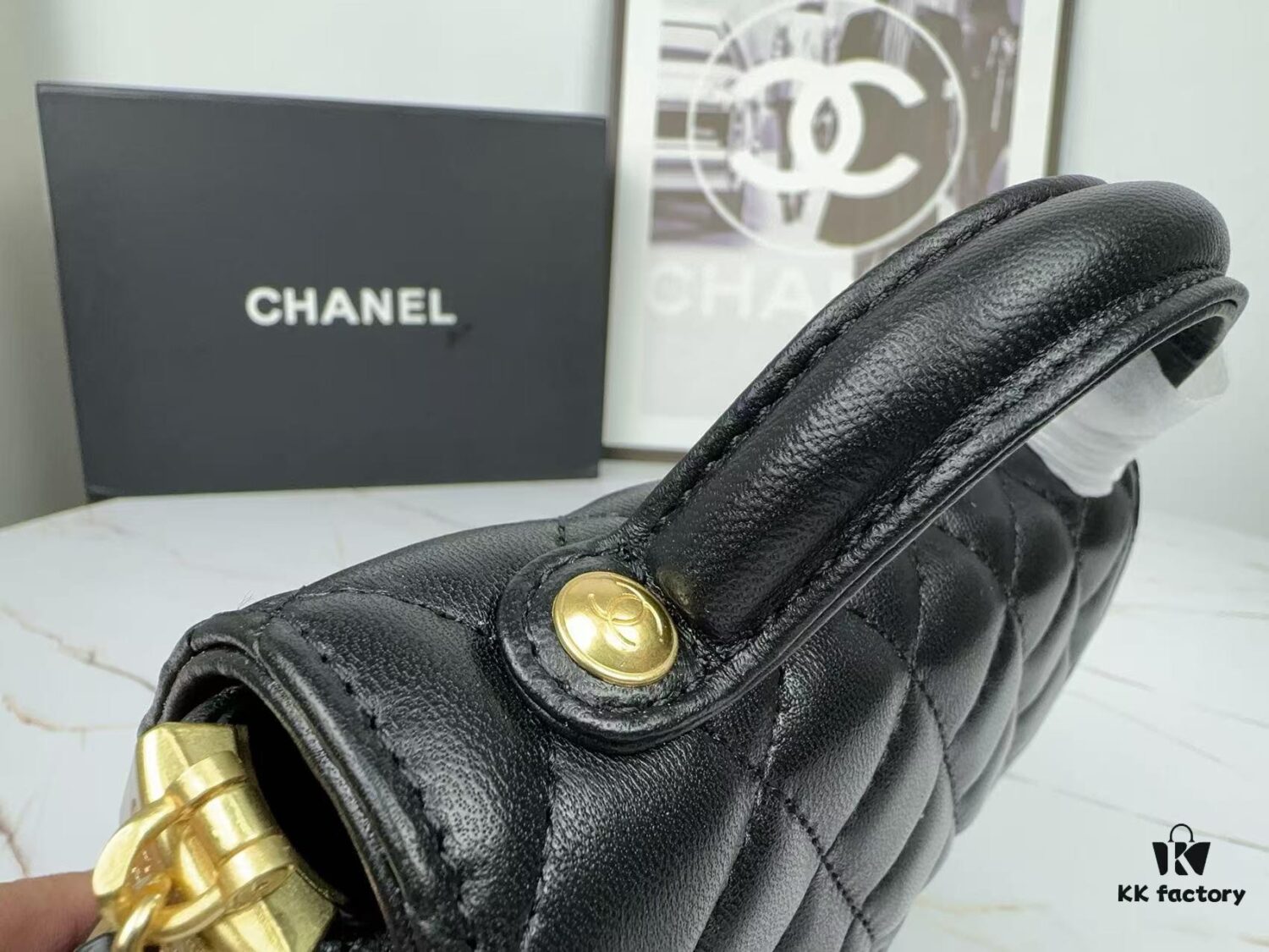 693043f4f09edb6de4c4db7c CHANEL 25P New Handle Top Handle Bag Mini in Black and Gold Lambskin