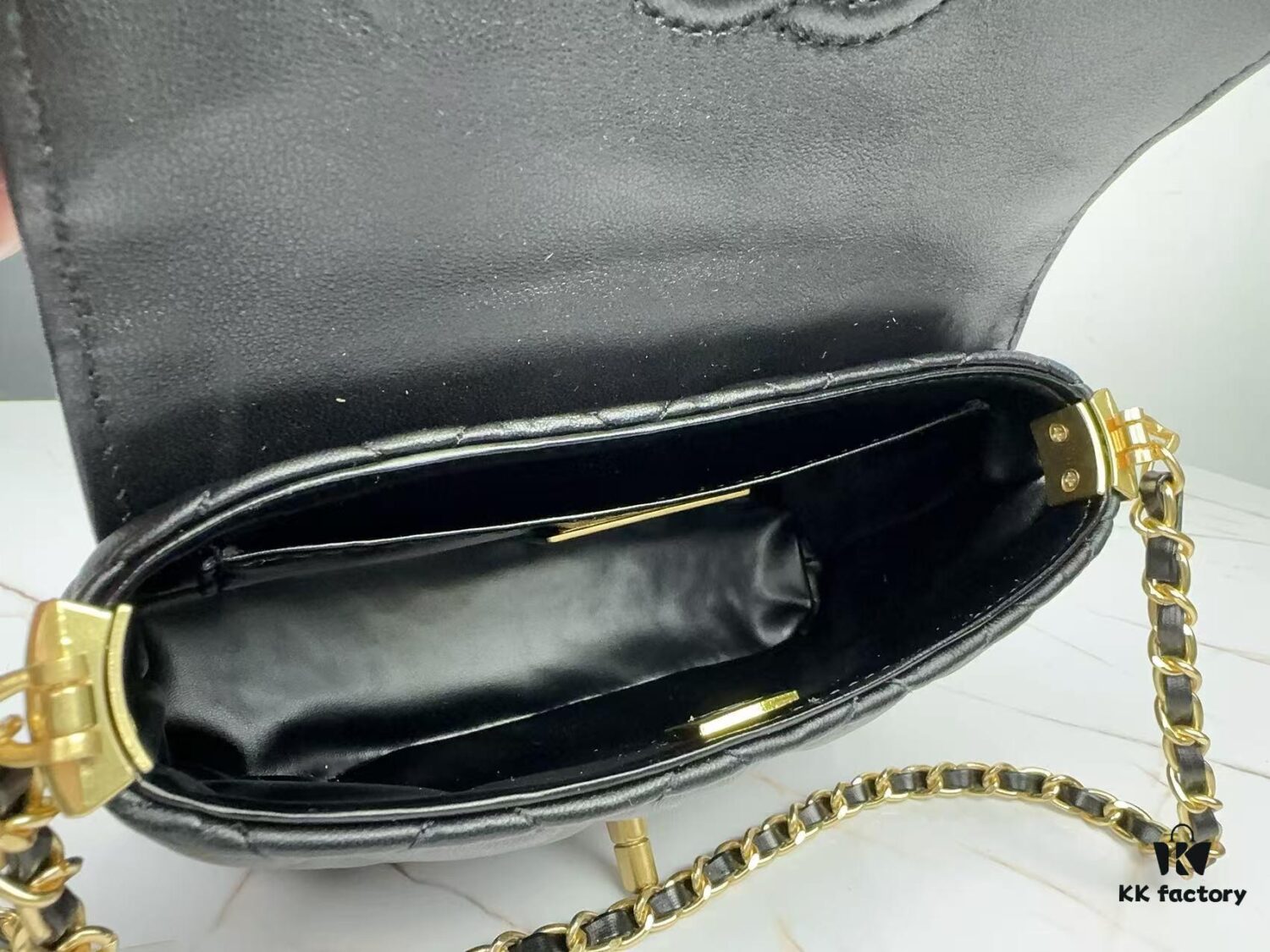 693043f7f09edb6de4c4db7e CHANEL 25P New Handle Top Handle Bag Mini in Black and Gold Lambskin