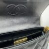 693043f7f09edb6de4c4db7f CHANEL 25P New Handle Top Handle Bag Mini in Black and Gold Lambskin