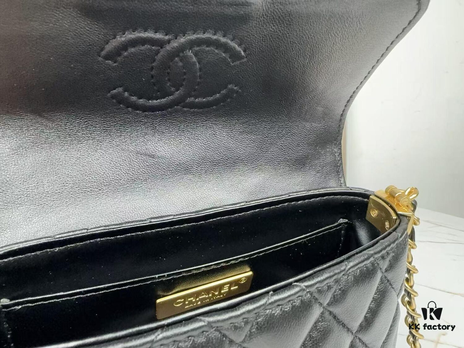 693043f7f09edb6de4c4db7f CHANEL 25P New Handle Top Handle Bag Mini in Black and Gold Lambskin