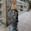 6930444ef09edb6de4c4dbf8 Box Included The Trash Bag Trend Is Huge, I'm Obsessed with Balenciaga Again