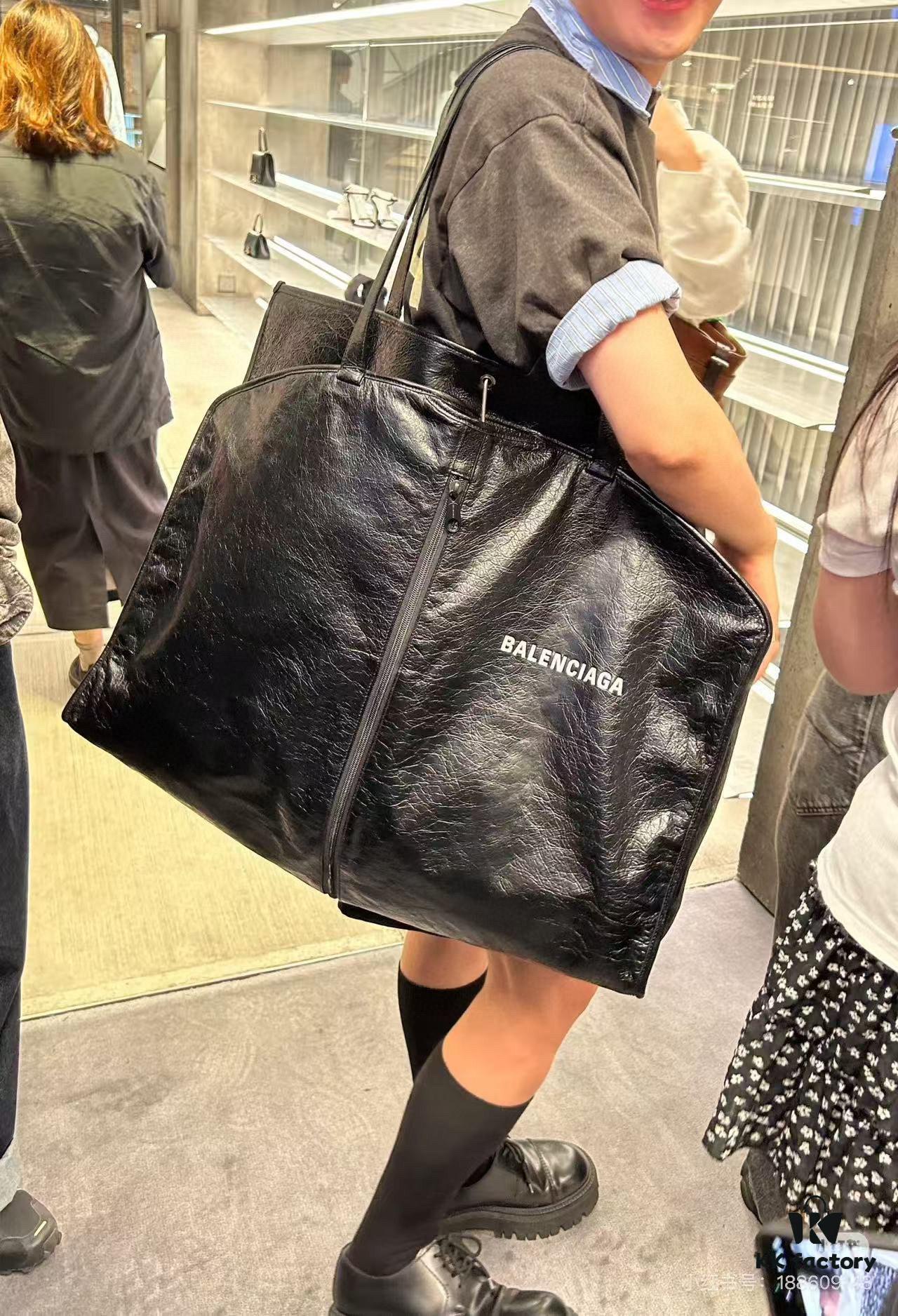 69304452f09edb6de4c4dbfc Box Included The Trash Bag Trend Is Huge, I'm Obsessed with Balenciaga Again