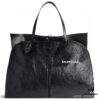 69304453f09edb6de4c4dbfd Box Included The Trash Bag Trend Is Huge, I'm Obsessed with Balenciaga Again