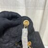 693047ecf09edb6de4c4e00c Chanel Washed Denim 25C Hobo Bag with Quilted Ball Texture, Vintage Coin Button Drawstring Bucket Bag in Retro Black and Gold with Diamond Stitching, Classic Chain Design
