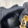 693047f2f09edb6de4c4e00e Chanel Washed Denim 25C Hobo Bag with Quilted Ball Texture, Vintage Coin Button Drawstring Bucket Bag in Retro Black and Gold with Diamond Stitching, Classic Chain Design