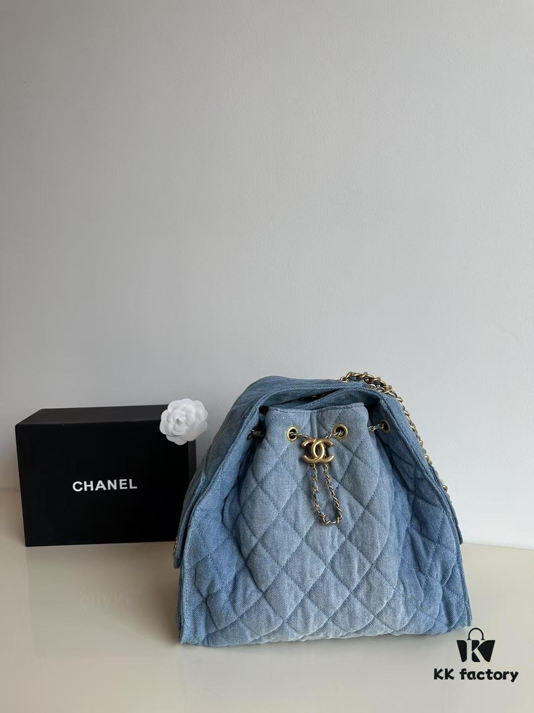 693047f5f09edb6de4c4e011 Chanel Washed Denim 25C Hobo Bag with Quilted Ball Texture, Vintage Coin Buckle Drawstring Bucket Bag in Retro Black and Gold with Diamond Stitching and Classic Chain Design
