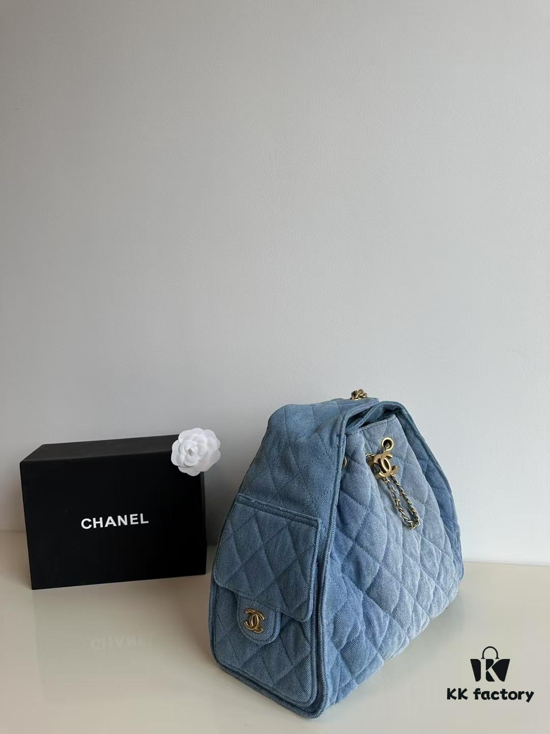 693047f6f09edb6de4c4e012 Chanel Washed Denim 25C Hobo Bag with Quilted Ball Texture, Vintage Coin Buckle Drawstring Bucket Bag in Retro Black and Gold with Diamond Stitching and Classic Chain Design