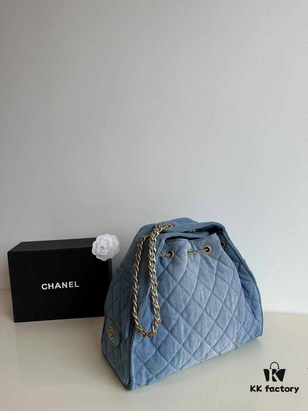693047f9f09edb6de4c4e014 Chanel Washed Denim 25C Hobo Bag with Quilted Ball Texture, Vintage Coin Buckle Drawstring Bucket Bag in Retro Black and Gold with Diamond Stitching and Classic Chain Design