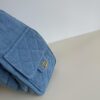 693047faf09edb6de4c4e015 Chanel Washed Denim 25C Hobo Bag with Quilted Ball Texture, Vintage Coin Buckle Drawstring Bucket Bag in Retro Black and Gold with Diamond Stitching and Classic Chain Design