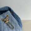693047faf09edb6de4c4e016 Chanel Washed Denim 25C Hobo Bag with Quilted Ball Texture, Vintage Coin Buckle Drawstring Bucket Bag in Retro Black and Gold with Diamond Stitching and Classic Chain Design