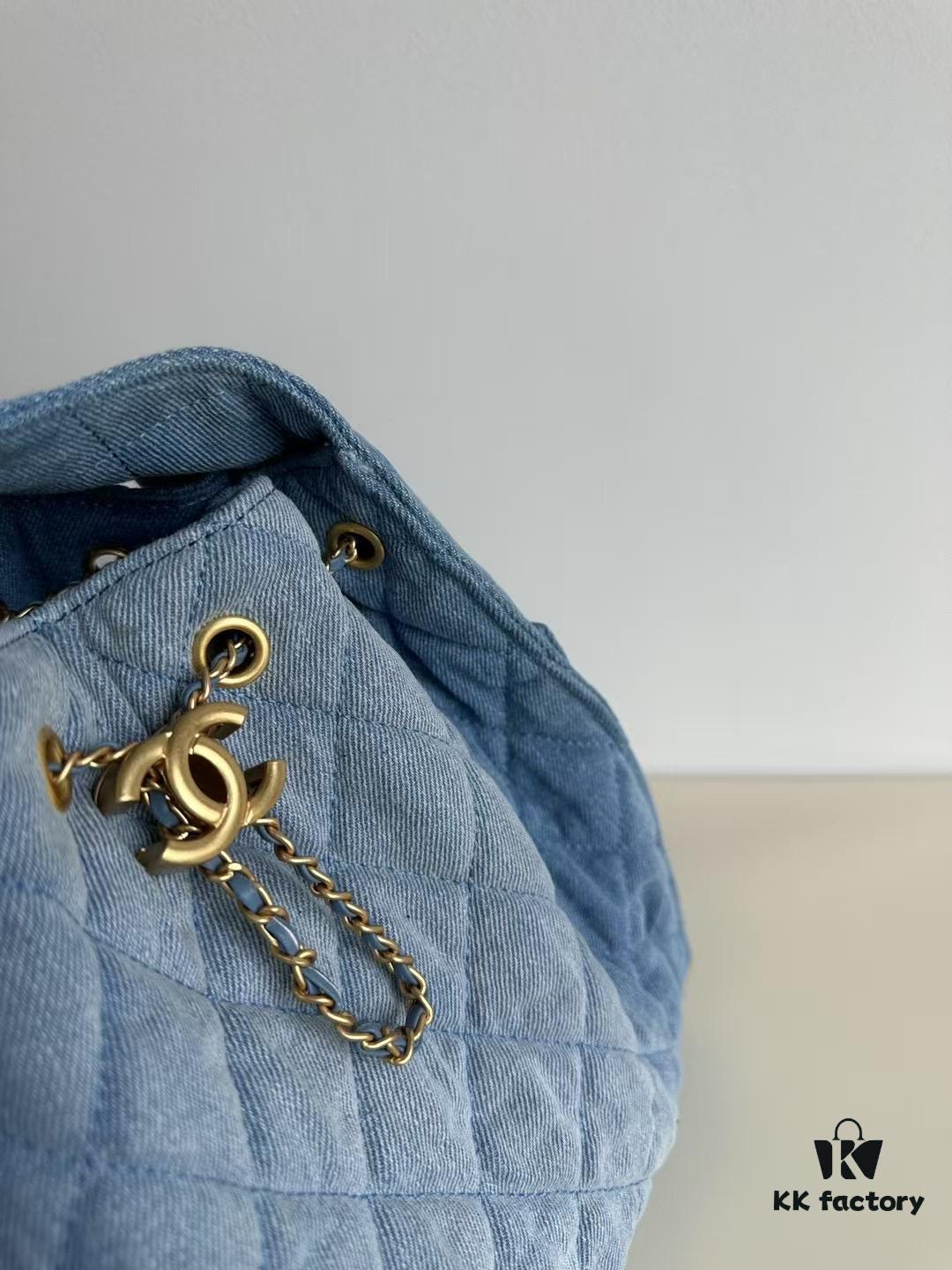 693047faf09edb6de4c4e016 Chanel Washed Denim 25C Hobo Bag with Quilted Ball Texture, Vintage Coin Buckle Drawstring Bucket Bag in Retro Black and Gold with Diamond Stitching and Classic Chain Design