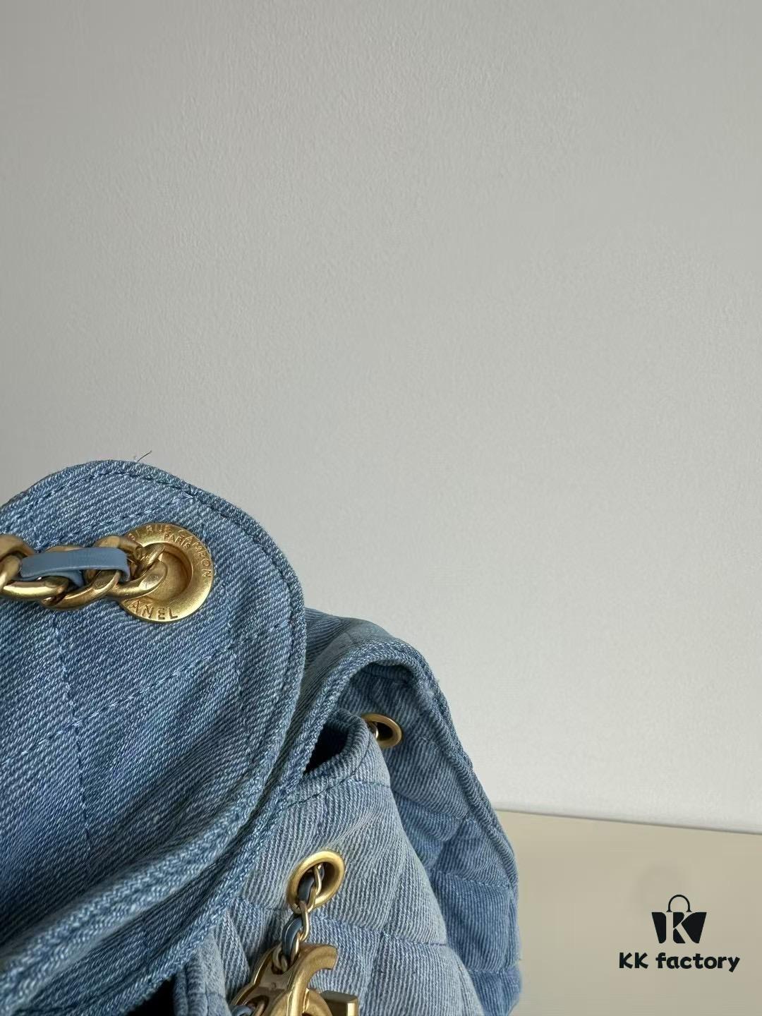 693047fff09edb6de4c4e018 Chanel Washed Denim 25C Hobo Bag with Quilted Ball Texture, Vintage Coin Buckle Drawstring Bucket Bag in Retro Black and Gold with Diamond Stitching and Classic Chain Design