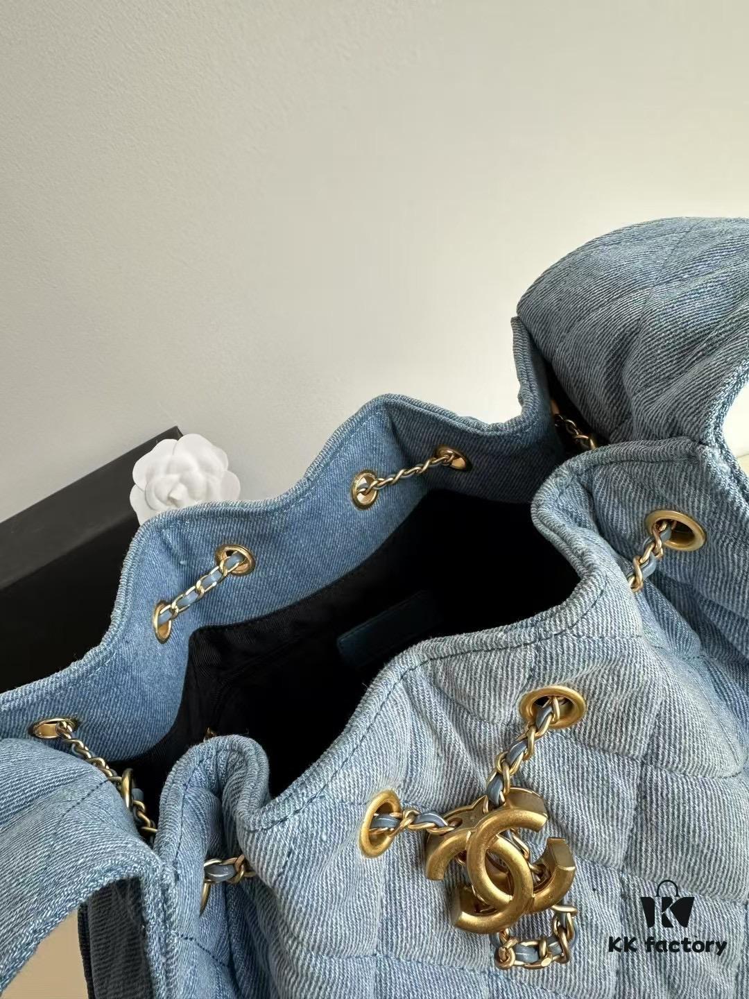 693047fff09edb6de4c4e019 Chanel Washed Denim 25C Hobo Bag with Quilted Ball Texture, Vintage Coin Buckle Drawstring Bucket Bag in Retro Black and Gold with Diamond Stitching and Classic Chain Design