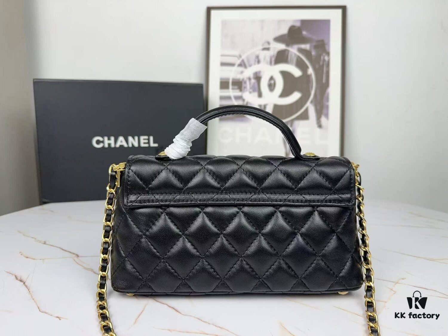 6930481cf09edb6de4c4e032 CHANEL 25P New Handle Top Handle Bag Mini in Black and Gold Lambskin