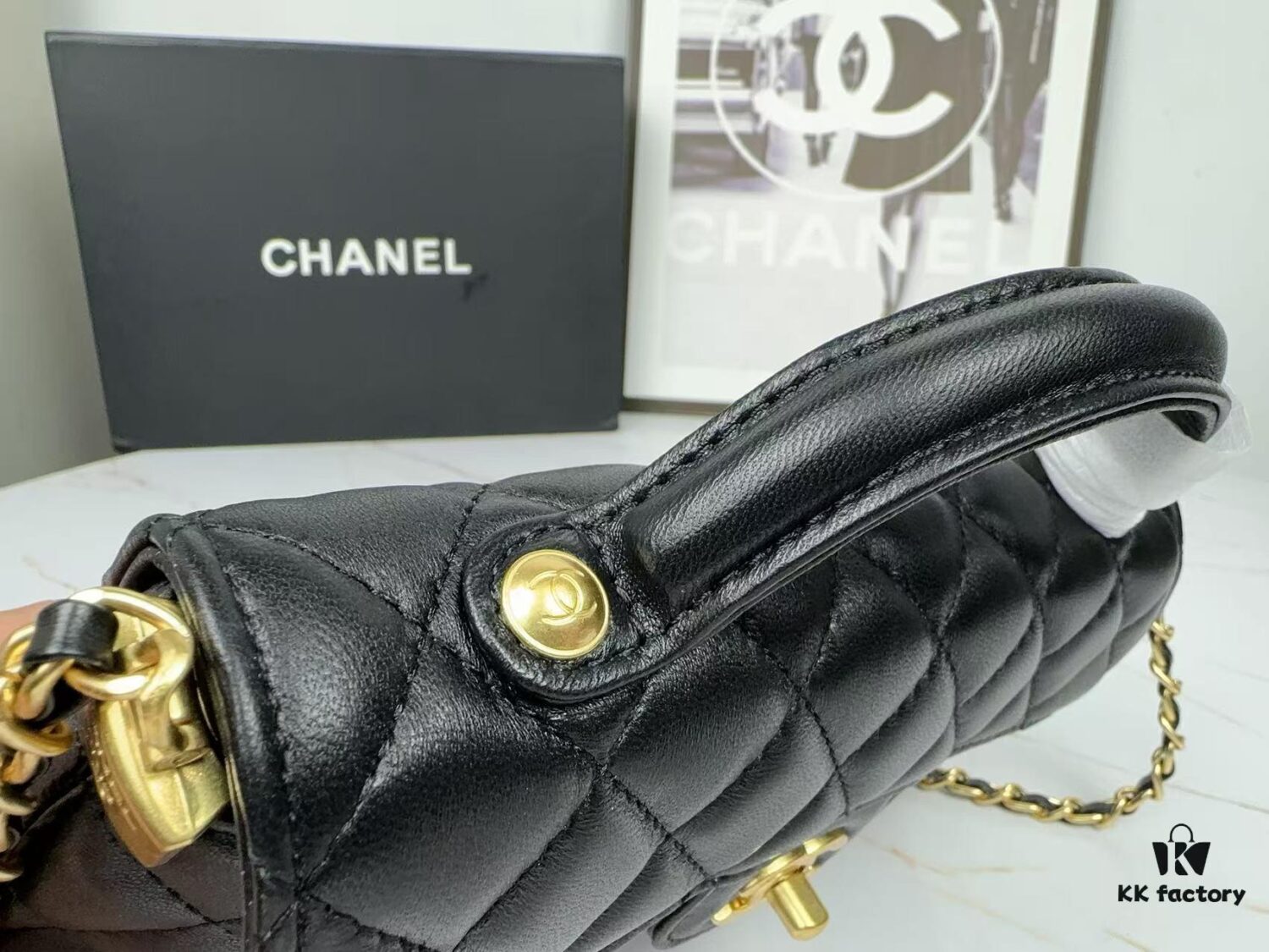 69304821f09edb6de4c4e037 CHANEL 25P New Handle Top Handle Bag Mini in Black and Gold Lambskin