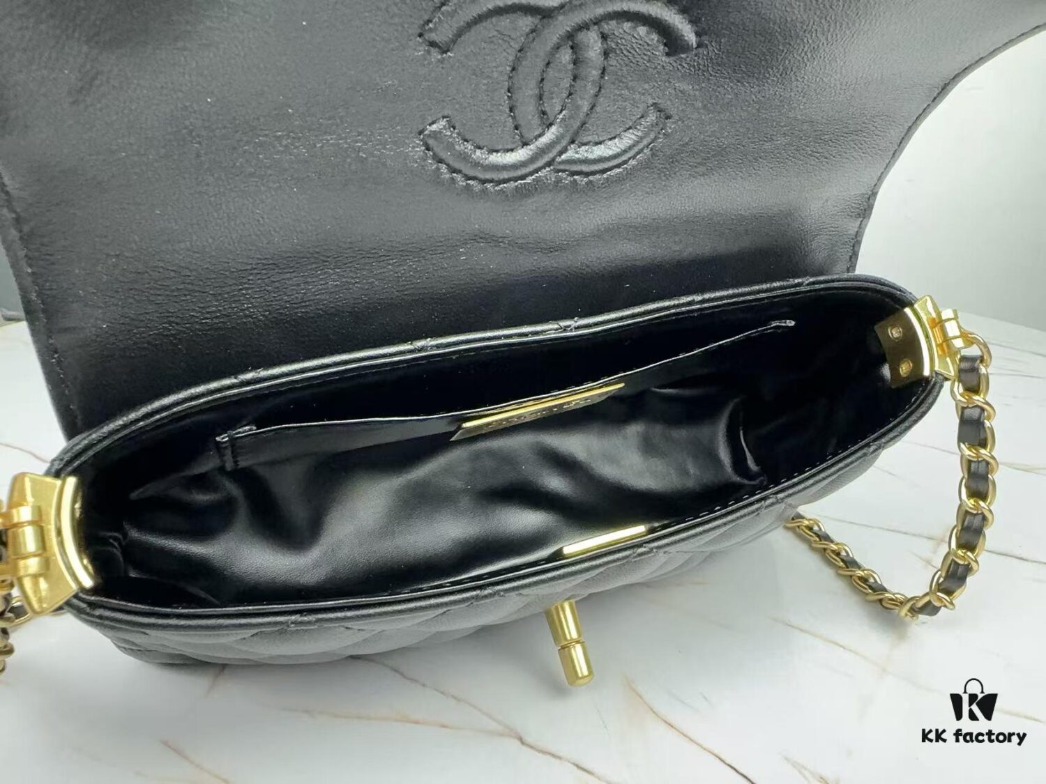69304823f09edb6de4c4e039 CHANEL 25P New Handle Top Handle Bag Mini in Black and Gold Lambskin