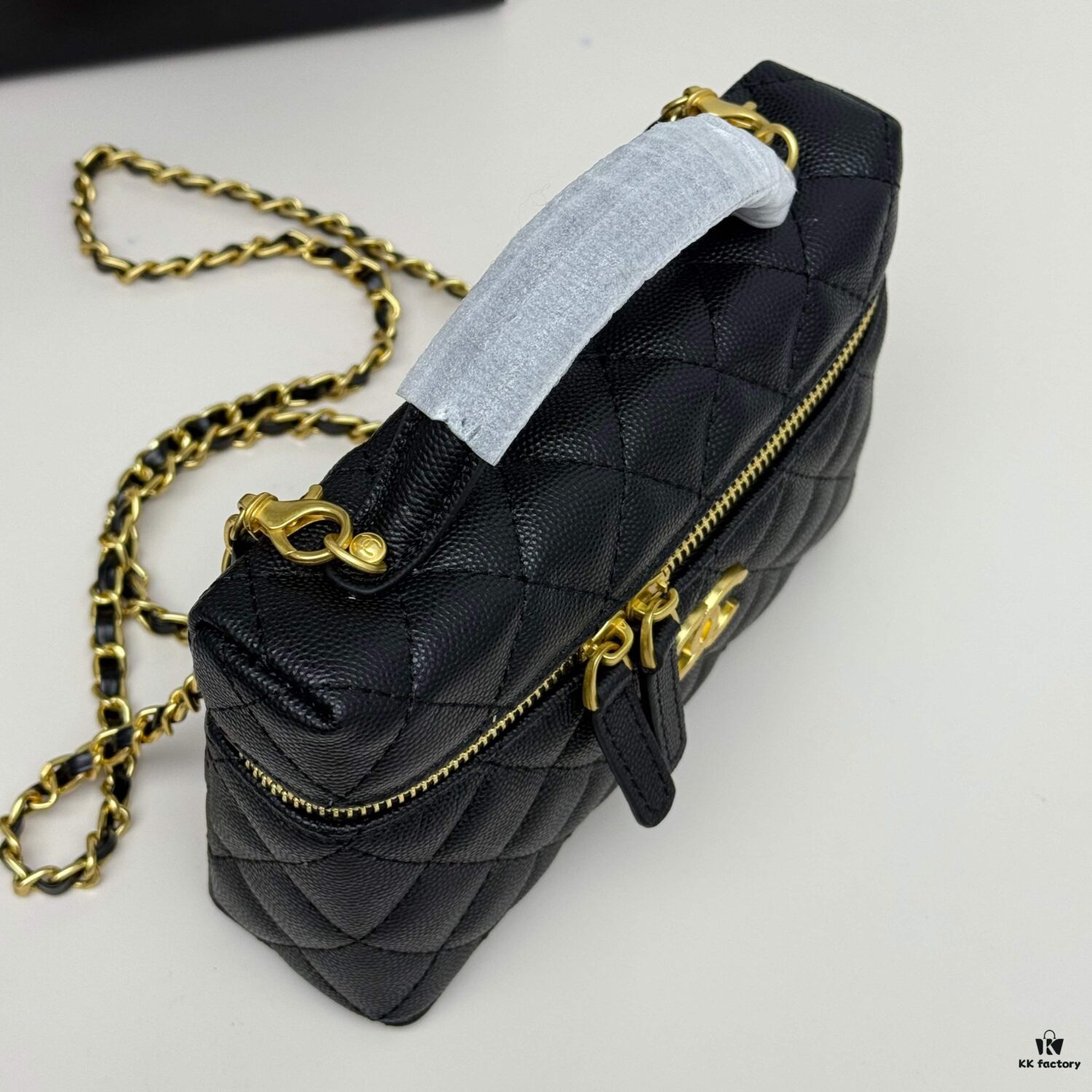 69304842f09edb6de4c4e04d CHANEL 25P Black and Gold Brushed Logo Flat Box Bag in Top-Grain Caviar Leather