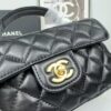 69304877f09edb6de4c4e072 CHANEL 25P New Handle Top Handle Bag Mini in Black and Gold Lambskin