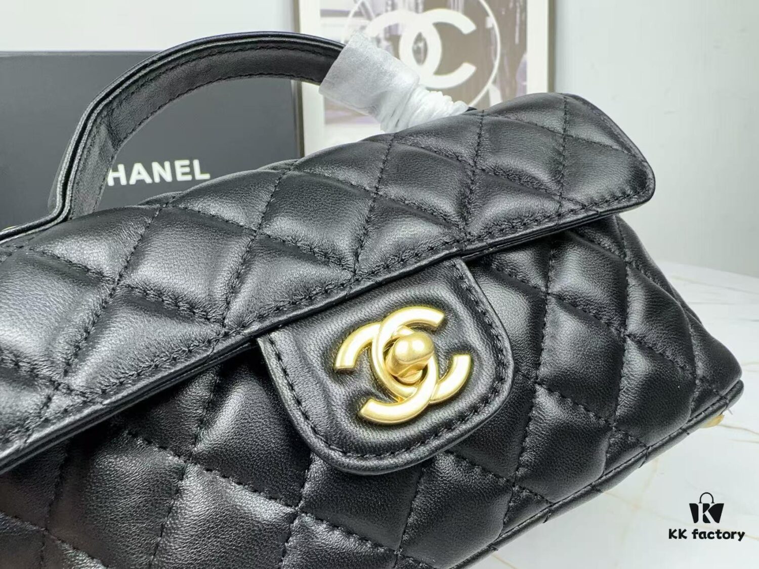 69304877f09edb6de4c4e072 CHANEL 25P New Handle Top Handle Bag Mini in Black and Gold Lambskin