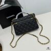 69304881f09edb6de4c4e07c CHANEL 25P Black and Gold Brushed Logo Flat Box Bag in Top-Grain Caviar Leather