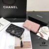 693048cdf09edb6de4c4e0dd Chanel 12001 Mini Wallet in Black and Pink – Crafted from Premium Lambskin