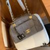 693049b0f09edb6de4c4e218 Chanel Washed Denim Bowling Bag - Pre-loved Chic