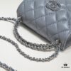 69304acff09edb6de4c4e3a2 Small Chanel Kelly Bag in Black Lamb Leather with Long Handle