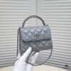 69304ad0f09edb6de4c4e3a6 Small Chanel Kelly Bag in Black Lamb Leather with Long Handle
