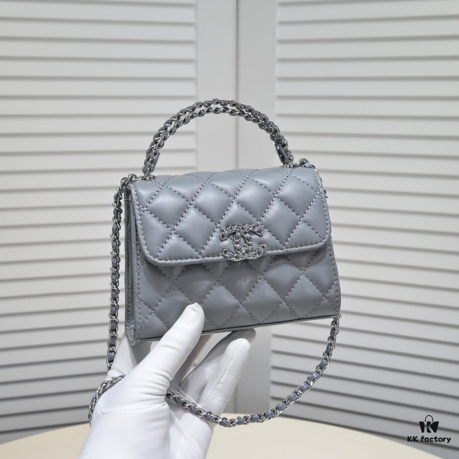 69304ad0f09edb6de4c4e3a6 Small Chanel Kelly Bag in Black Lamb Leather with Long Handle