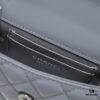 69304ad9f09edb6de4c4e3b7 Small Chanel Kelly Bag in Black Lamb Leather with Long Handle