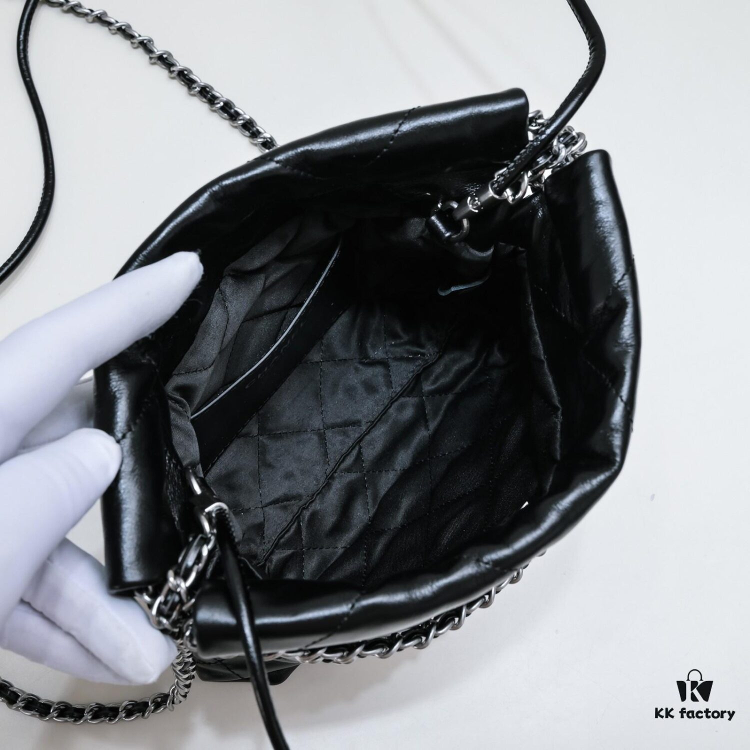 69304c85f09edb6de4c4e66f Chanel Mini 22 Bag Strikes Right in the Heart