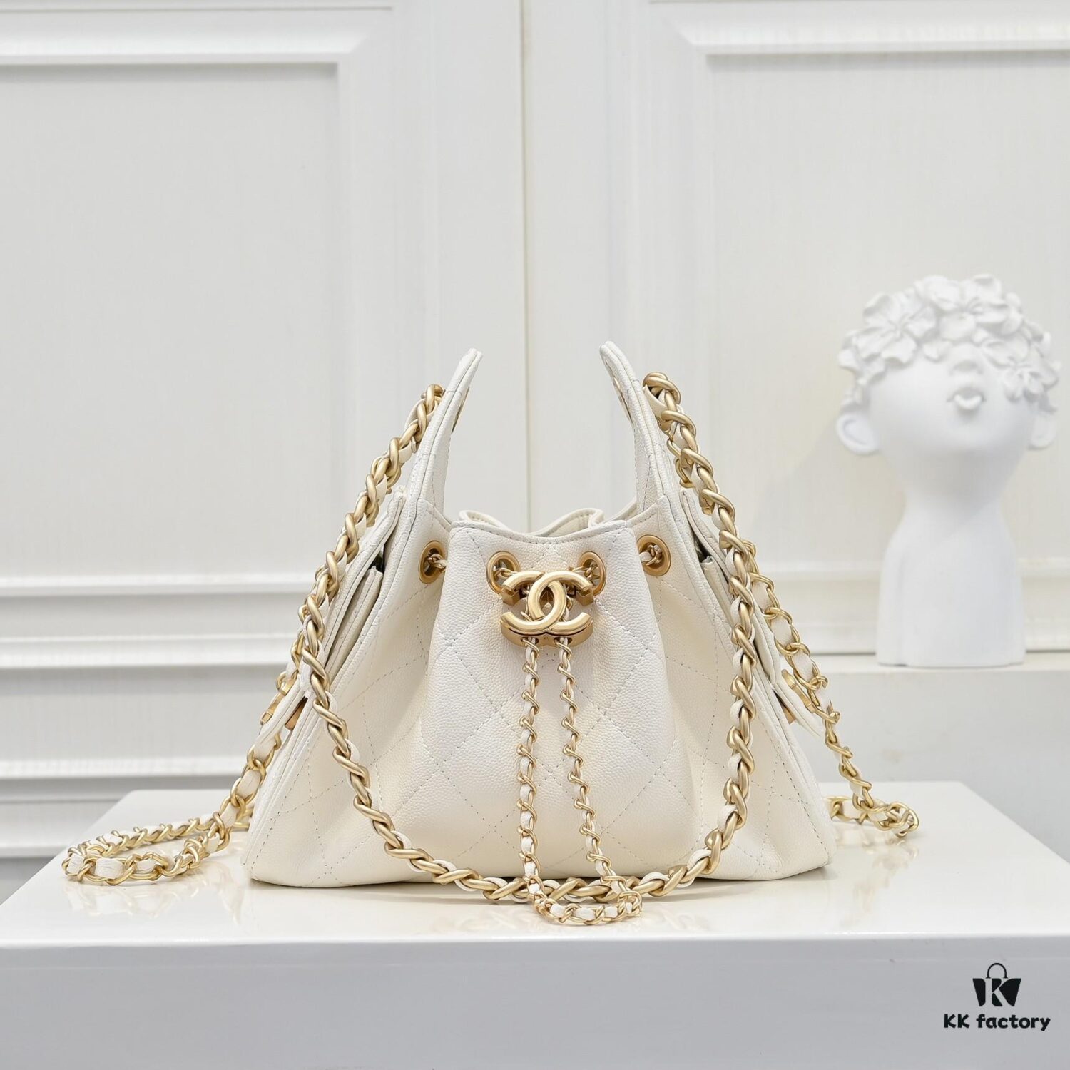 69304d06f09edb6de4c4e72f Mini Chanel 25C Hobo Bag in Quilted Calfskin with Vintage Gold Buckle Drawstring Bucket Design + Diamond Stitching + Retro Black and Gold Tone, Classic Chain Strap, Elegant and Versatile