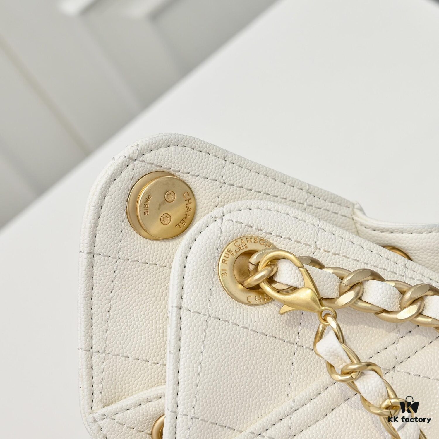 69304d0bf09edb6de4c4e735 Mini Chanel 25C Hobo Bag in Quilted Calfskin with Vintage Gold Buckle Drawstring Bucket Design + Diamond Stitching + Retro Black and Gold Tone, Classic Chain Strap, Elegant and Versatile