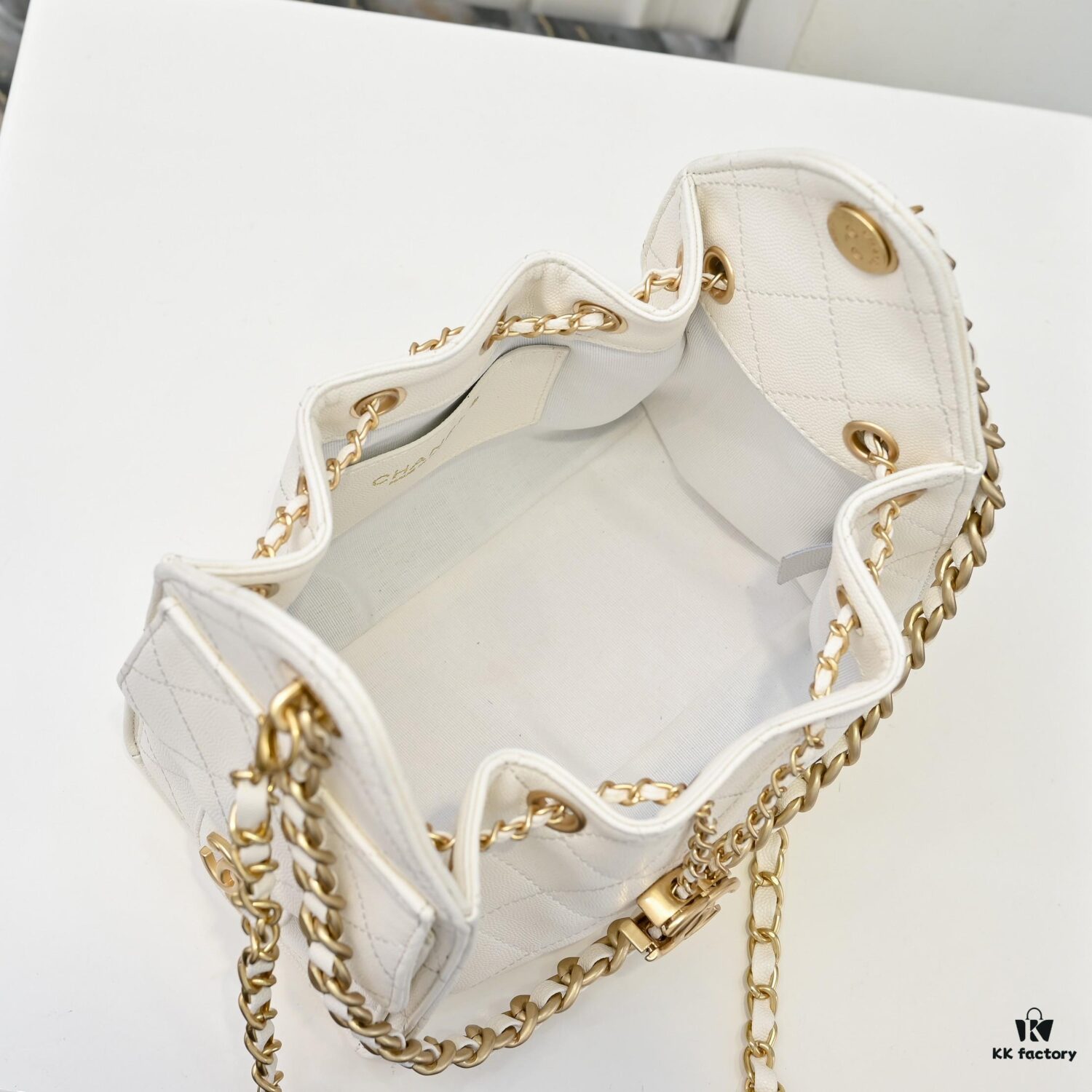 69304d0ef09edb6de4c4e737 Mini Chanel 25C Hobo Bag in Quilted Calfskin with Vintage Gold Buckle Drawstring Bucket Design + Diamond Stitching + Retro Black and Gold Tone, Classic Chain Strap, Elegant and Versatile