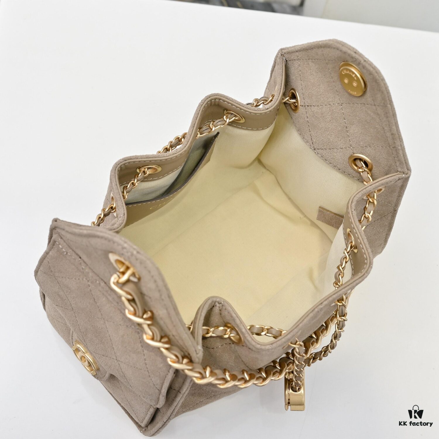69304d78f09edb6de4c4e7ab Mini Chanel 25C Hobo Bag in Suede, Crossbody Bucket Bag with Vintage Coin Toggle Drawstring, Diamond Quilting, Retro Black-Gold Hardware, Classic Chain Design