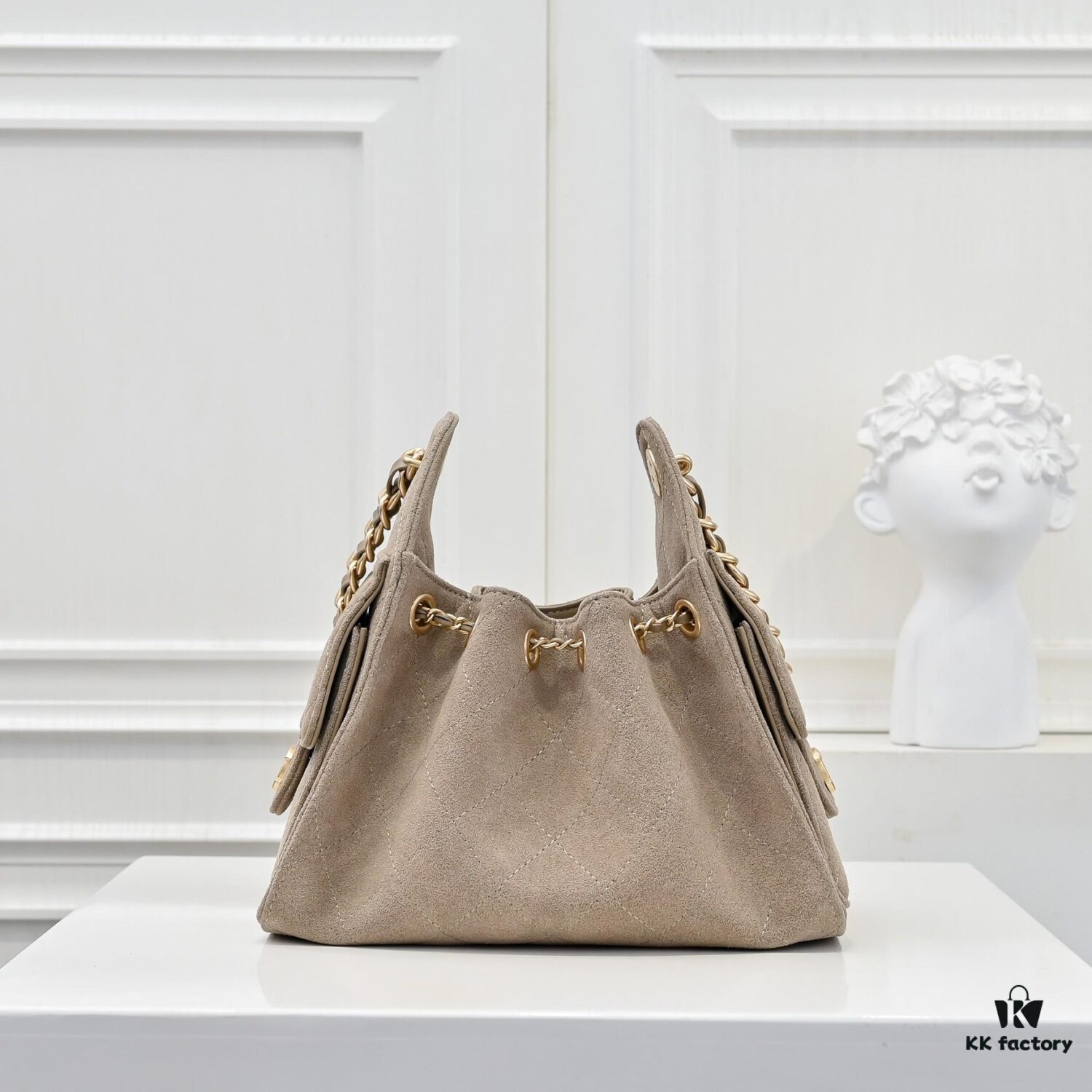 69304d7df09edb6de4c4e7b1 Mini Chanel 25C Hobo Bag in Suede, Crossbody Bucket Bag with Vintage Coin Toggle Drawstring, Diamond Quilting, Retro Black-Gold Hardware, Classic Chain Design