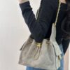 69304df9f09edb6de4c4e848 Upgraded Chanel 25C Style Hobo Bag in Quilted Calf Leather – Vintage Gold Buckle Drawstring Bucket Bag with Diamond Stitching and Retro Black-Gold Accents